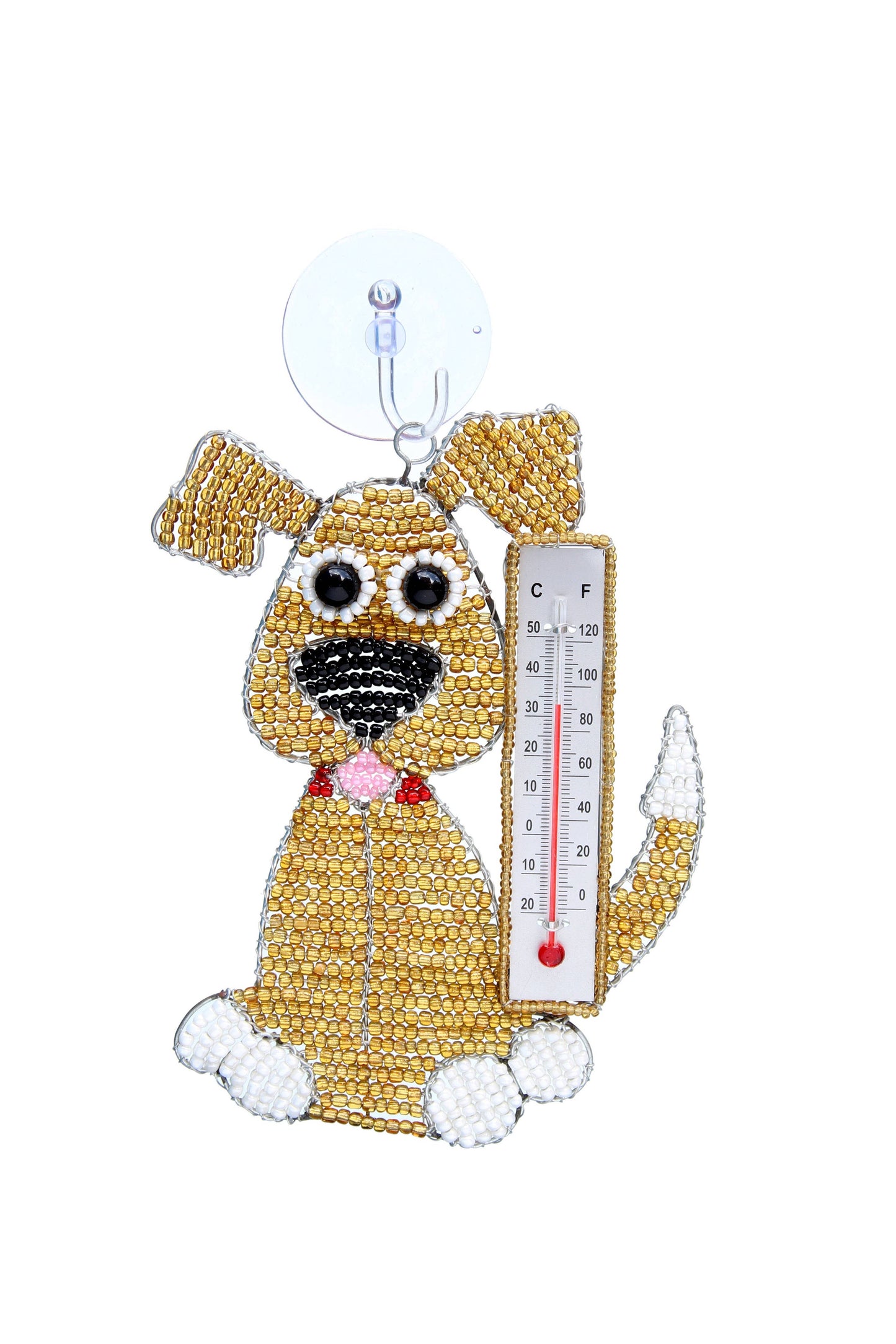 Decorative dog ornament with a thermometer on a white background