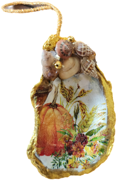 Pumpkin ornament on a oyster shell 
