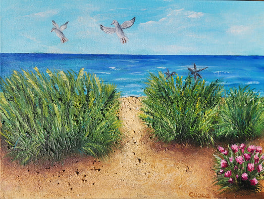 An acrylic painting of sand dunes and ocean with human ashes in the paint.  Two Seagulls, the large one the deceased husband watching over the wife.  Two dragonflies near by.